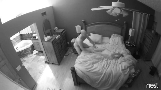 Ginger escort straddling client on bed in hot sex scene