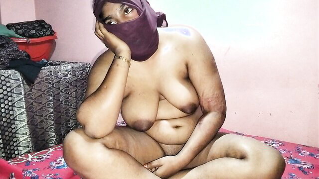Nude Indian BBW in hijab poses topless with big tits, homemade amateur
