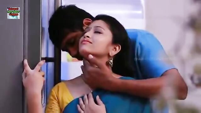 Hot Telugu couple romantic necking, man grabs woman's throat passionately