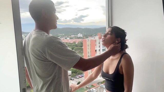 Saraymike gripped by hand on neck in tight tank top by window view