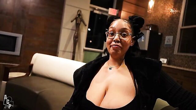 Queen Rogue with large breasts wearing glasses and black outfit