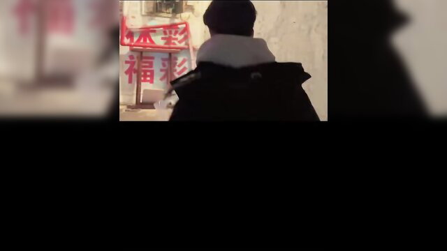 Chinese TikTok star in hoodie at red sex shop sign, big cock tease