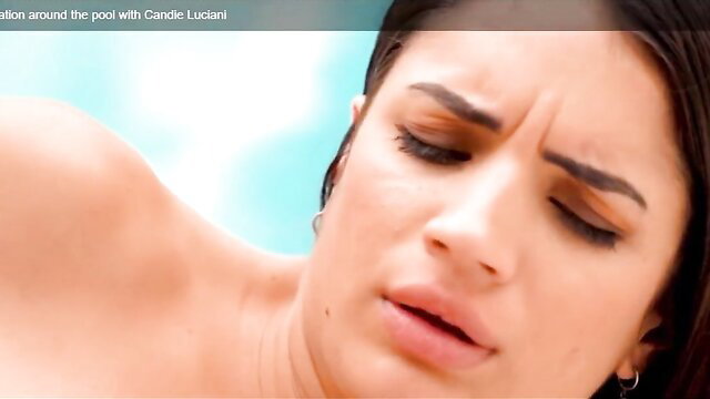 Candie Luciani relaxing by the pool