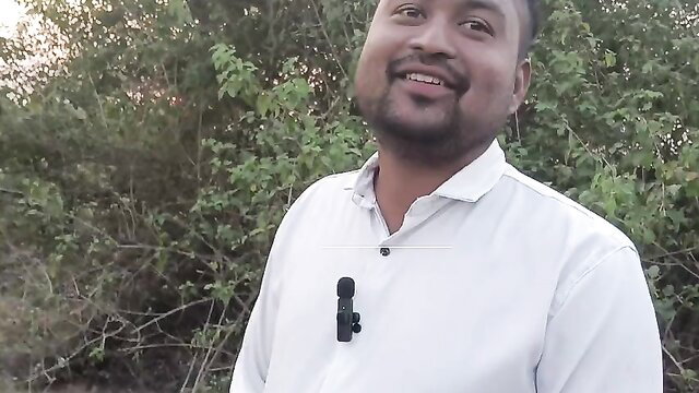 Smiling Desi man in white shirt outdoors jungle, Kavita Bhabhi cheat video