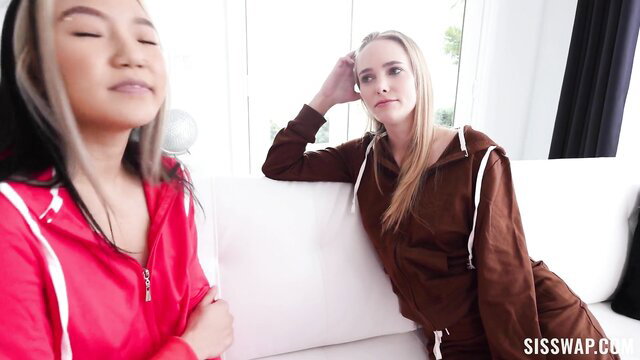 Athena Fleurs and Asia Lee in tracksuits on couch, My Dick's Cold