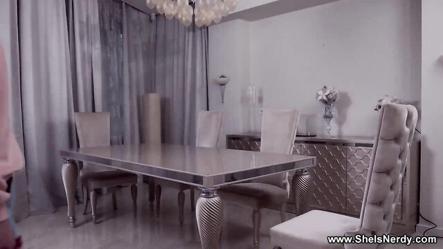 Slim teen in pink top grinds huge cock on lap at table