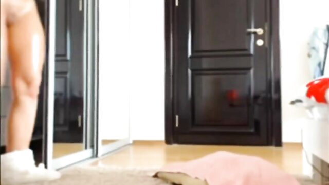 Hot babe with perfect round ass in white socks bending over nude