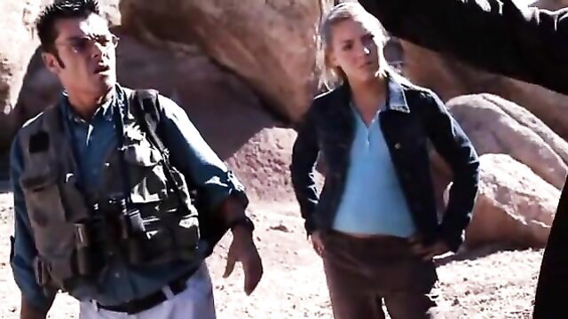 Blonde babe and rugged guy in outdoor vampire sex adventure