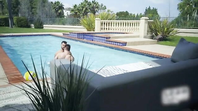 Two muscular men embracing nude by pool in gay adult video thumbnail