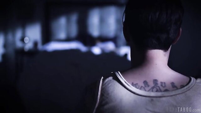 Savannah Sixx back view with sexy tattoos, tank top tease