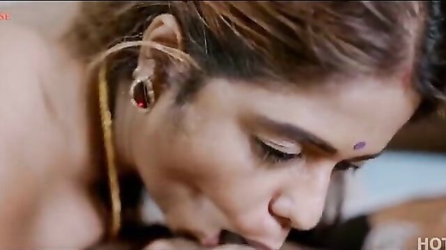 Indian beauty in gold jewelry giving hot close-up blowjob