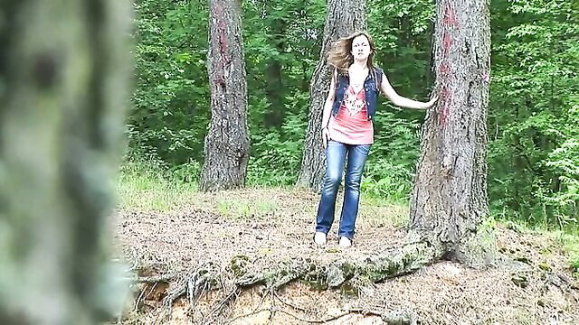 Horny amateur slut in pink tank top & jeans by trees outdoors