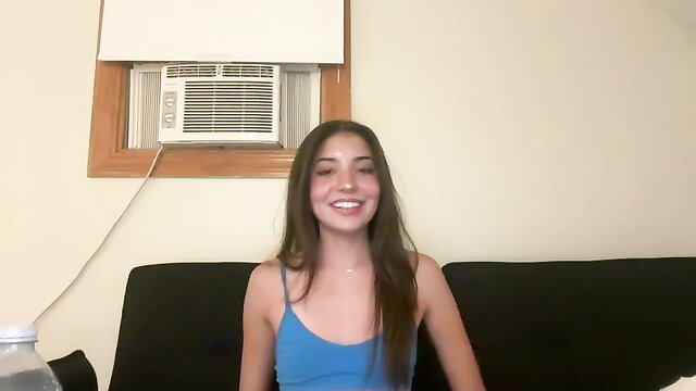 Rachelxbennett smiling in tank top, hot 18yo natural Chaturbate cam girl