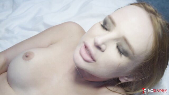 Kaisa Nord nude on bed, pale tits and sultry gaze closeup