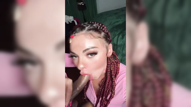 Ms Trigga Happy with braids sucking dildo closeup