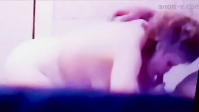 Blonde woman in white panties on knees sucking cock closeup