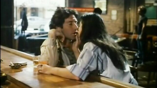 Vintage couple kissing intimately at bar in Juliet's Vista Valley PTA