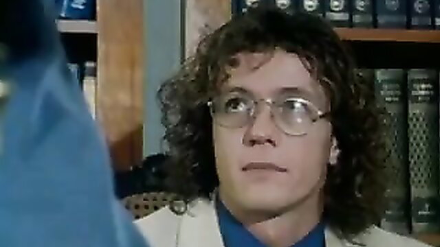 Handsome Italian guy with curly hair and glasses in suit, adult video thumbnail