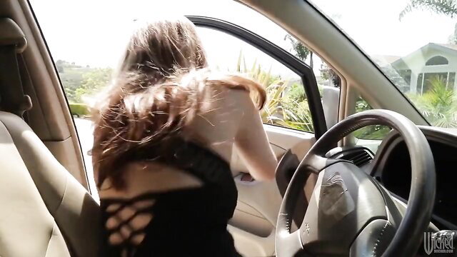 Hot blonde MILF in sexy lace top leans out car window teasing