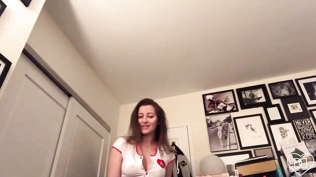 Dani Daniels in sexy nurse costume smiling seductively