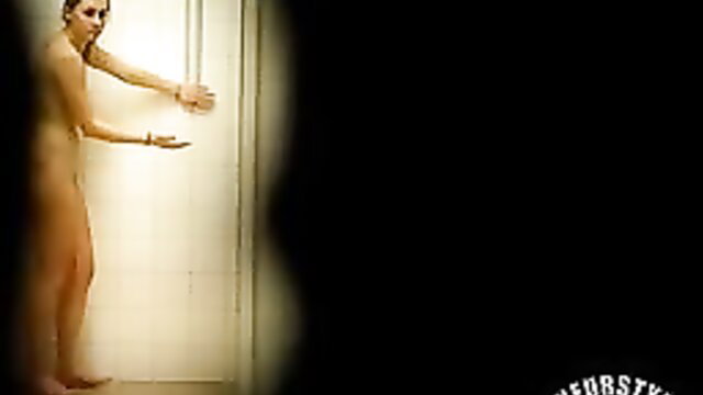 Nude cute French coed peeking from steamy shower door