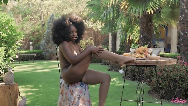 Black sweetie Elsie nude in garden, big afro, curvy body, Twistys solo