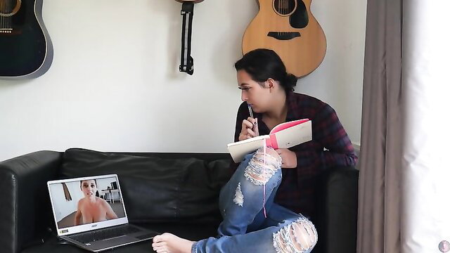 Summer Fox studying while watching nude cam girl on laptop