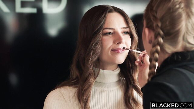 Hope Heaven with lipstick applied by blonde, sexy makeup scene