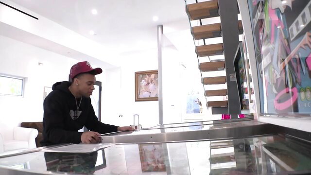 Chanel Barbie chubby blonde model sits at desk in luxury home