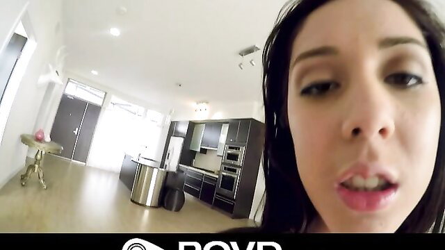 Innocent petite girl's close-up POV face in luxurious home