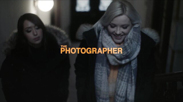 Zazie Skymm and brunette in fur coats, smiling in The Photographer adult scene