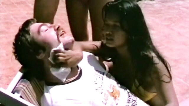 Vintage 70s brunette Asian babe wiping cum off white guy's face poolside