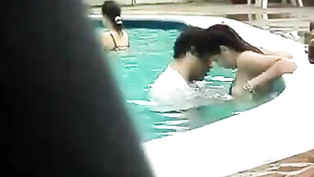 Amateur voyeur couple caught fucking in pool, wet Asian beauty rides guy