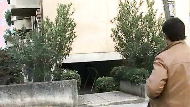 Hot Asian shemale in leather jacket at outdoor stairs entrance