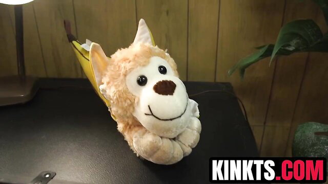 Cute plush monkey in banana toy by Jessy Dubai in Kink BDSM
