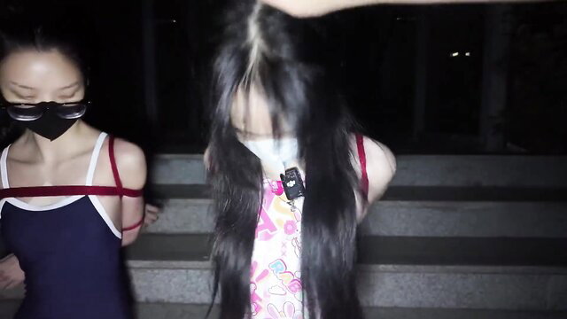 Chinese girls outdoor BDSM exhibitionism training, harness bondage on stairs