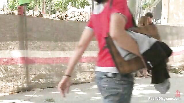 Cute redhead teen carrying bag, walking in tight jeans outdoors