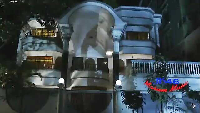 Luxurious white mansion exterior at night, Bangla movie thumbnail