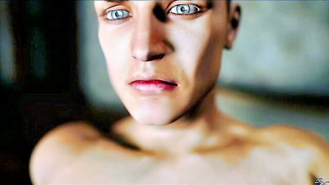 Handsome shirtless young man with piercing blue eyes closeup