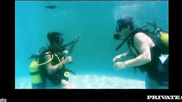 Priva scuba diving underwater with instructor, pre-fuck anal lesson