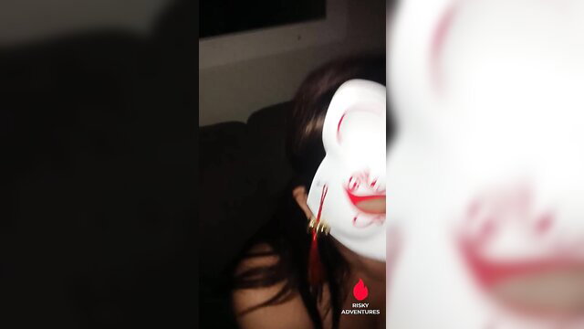 Chubby Filipina escort in creepy mask gives masked BJ closeup