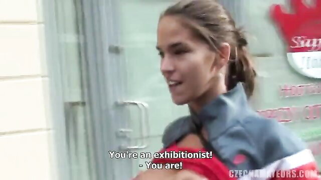 Silvie Deluxe called an exhibitionist in track jacket outdoors