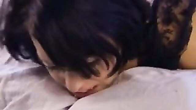 Brunette in lingerie lies face down ready for anal fuck