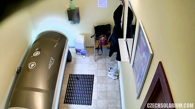 Blonde in tanning bed, solo solarium tease, nude ass up