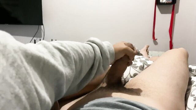 Amateur POV handjob closeup on woman's thigh, gray sweatsuit tease