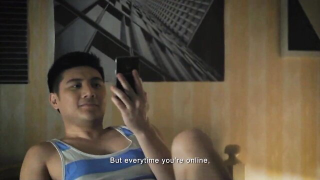 Filipino celeb guy in tank top checks phone online, nude live show tease