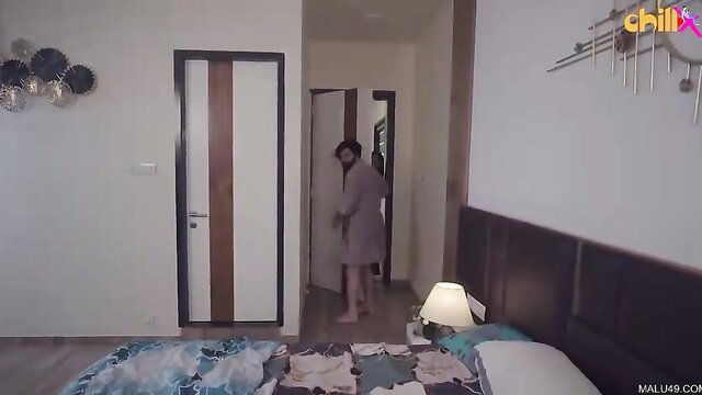 Mahi Bhabhi in robe on bed, big boobs Indian bhabhi tease