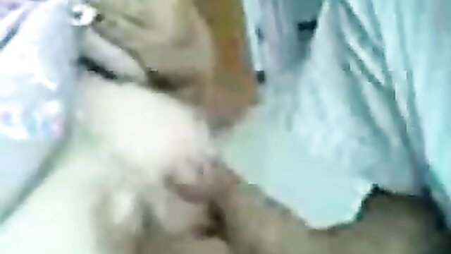 Lewd Asian couple shyly kisses and spoons nude on camera