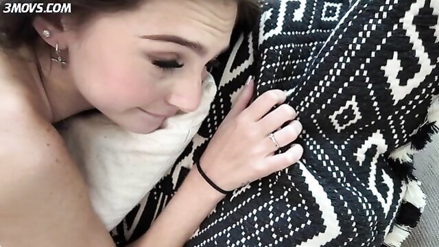 Sophie Tyler nude on pillows, teasing closeup face and tits