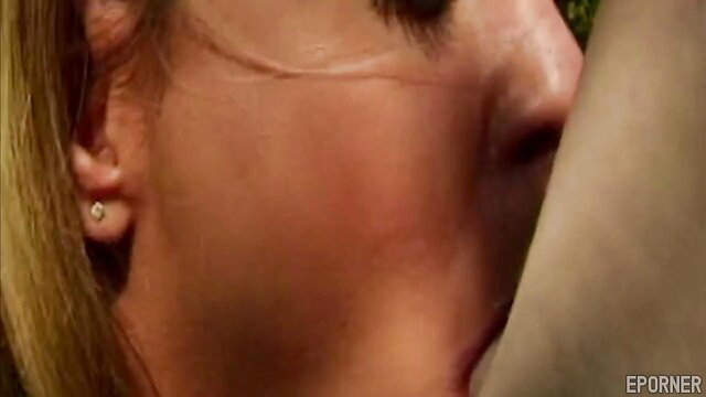 Blonde woman passionately kissing man closeup in hot sex scene